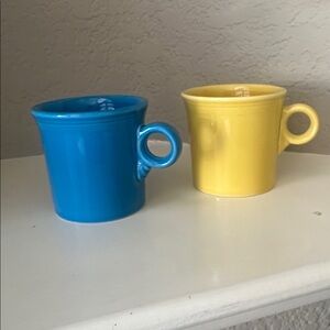 2 Fiesta coffee mugs Blue and Yellow